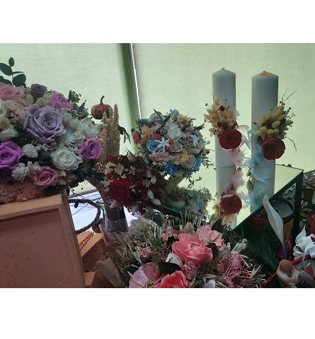 VELAS CON RAMOS DE FLORES PRESERVADAS